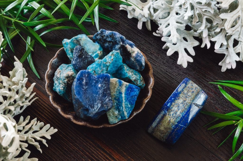 lapis lazuli with leaves on table