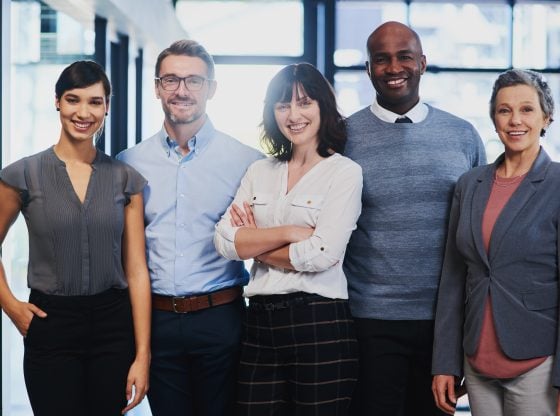 diverse group of professional psychics standing together