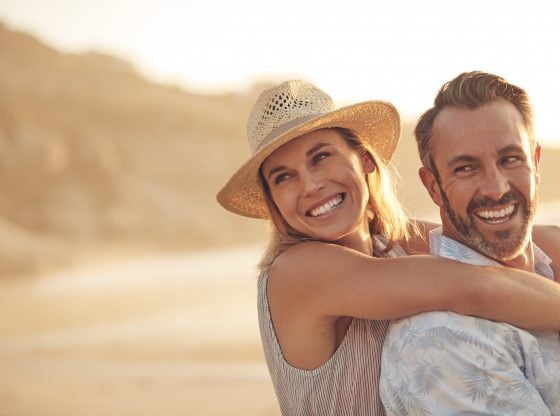 happy, mature couple at the beach